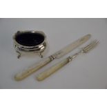 A George III silver dessert knife and fork with mother of pearl handles