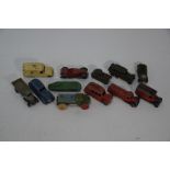 Eleven vintage Dinky models and a painted wood Tri-ang tanker