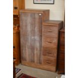 A limed oak children's wardrobe in the manner of Heals