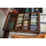 A large carved hardwood open bookcase with adjustable shelves