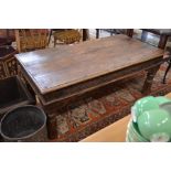 An Eastern hardwood and metal bound coffee table