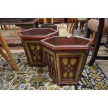 Pair of painted hexagonal planters with fret cut panels