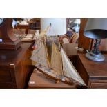 A fully-rigged model yacht