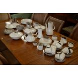 A quantity of 1970s Poole two-tone mushroom/sepia dinner, tea and coffee wares