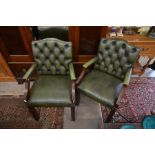 A pair of mahogany framed open armchairs