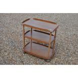 Ercol elm three tier trolley with turned beech sup