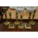 Three pairs of antique brass candlesticks