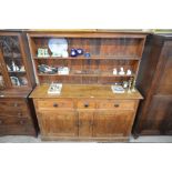 A substantial antique pine farmhouse dresser