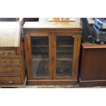 A Victorian walnut bookcase/display cabinet