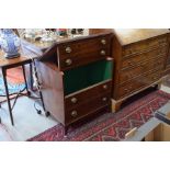 A mahogany commode in the form of a four drawer chest