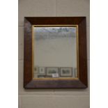 A rectangular oyster veneered wall mirror