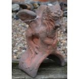 A cast terracotta small dragon ridge tile