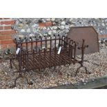 A large wrought iron fire basket