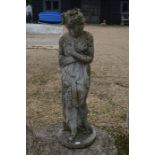 A weathered cast/reconstituted stone garden statue of 'Venus'
