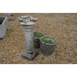 Two cast stone weathered planters to/w a pedestal birdbath