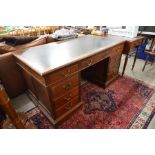 An Edwardian twin pedestal desk