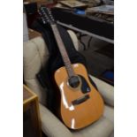 A Gibson Epiphone model: PR100 12NA electro-acoustic twelve-string guitar