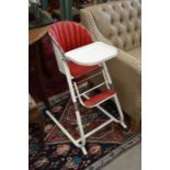 A retro Habitat 1960s child's high chair with red leather seat