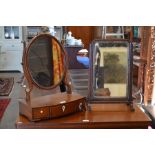 A Victorian mahogany oval toilet mirror