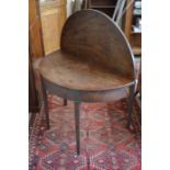 A 19th century mahogany demi lune tea table