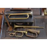 Assortment of brass bugles, cornets etc in Boosey & Hawkes case