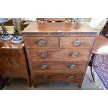 A George III mahogany chest of two short over three long drawers