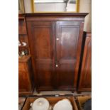 A 19th century mahogany wardrobe