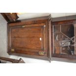 A 19th century oak hanging corner cupboard