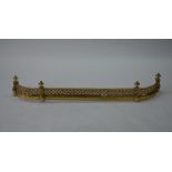 A heavy quality cast brass hearth fender