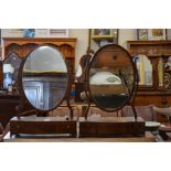 A 19th century mahogany oval toilet mirror