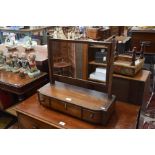 A late 19th century mahogany and ebony inlaid rectangular toilet mirror