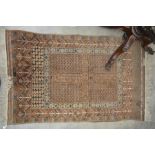 A Persian Hatchi design Turkoman rug