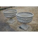 A pair of large Regency style garden circular planters