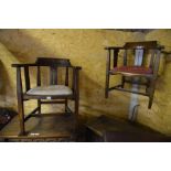 A pair of oak Arts & Crafts style bow-back armchairs