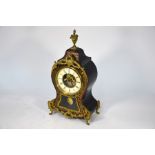 A late 19th century French part boulle cased 8-day mantle cloc