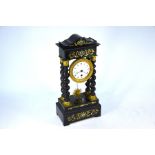 A Victorian ebonised and gilt mounted 8-day portico mantel clock