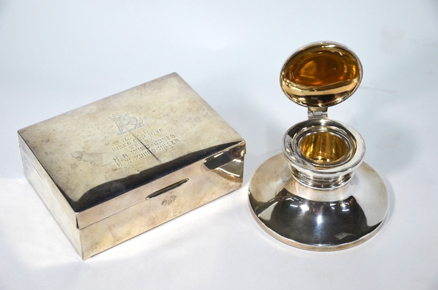 An Indian Colonial silver cigarette box with presentation inscription