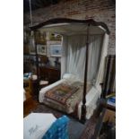 A Regency style mahogany full tester bed with chintz drapes
