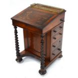 A Victorian rosewood Davenport desk