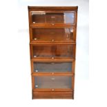 Globe Wernicke, an oak five section glazed library bookcase