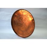 A large Middle Eastern circular brass tray