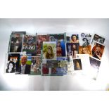 A quantity of signed photographs