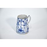 An early 19th century German porcelain mug of tapering form,
