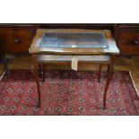 An antique ormolu mounted kingwood vitrine table