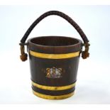 An old nautical brass bound coopered oak bucket
