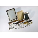 Three silver-faced photograph frames etc