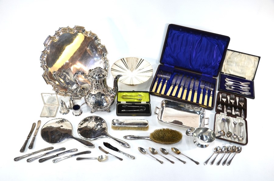 A silver brush set, flatware and other items