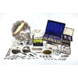 A silver brush set, flatware and other items