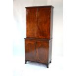 A Victorian mahogany two part library cabinet