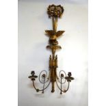 An 18th / 19th single eagle and ribbon-bow adorned twin scroll-arm giltwood sconce